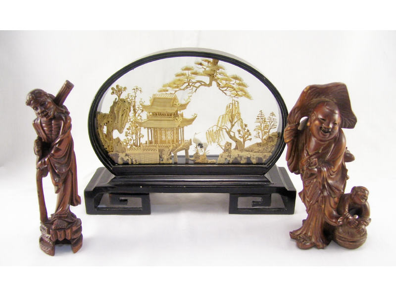 Appraisal: Oriental Lot Includes Two carved wooden Oriental figures and one