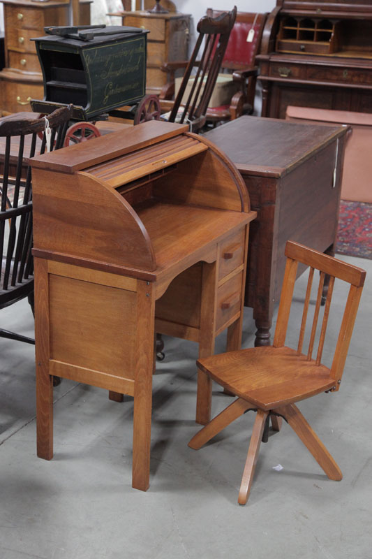 Appraisal: CHILD'S SIZE ROLLTOP DESK AND CHAIR Walnut having a tambour