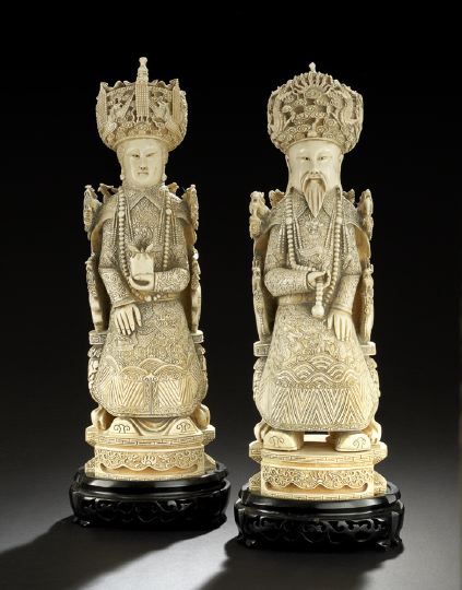 Appraisal: Large Pair of Chinese Carved Ivory Figures th century depicting