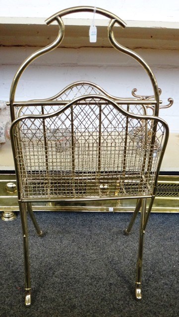 Appraisal: A late Victorian brass two division Canterbury stamped 'HALL' with