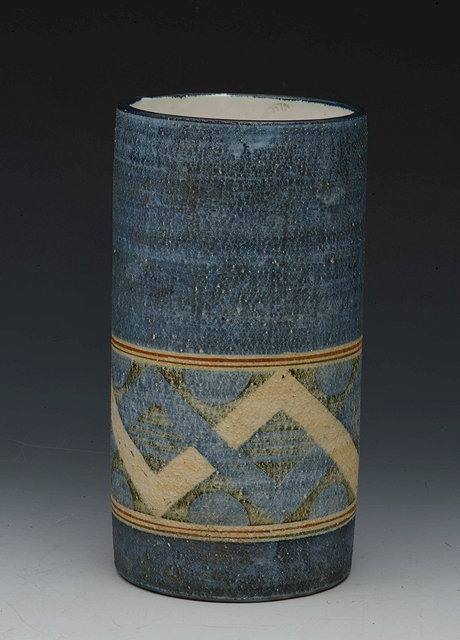 Appraisal: A Troika cylindrical vase with banded geometric decoration signed 'TROIKA