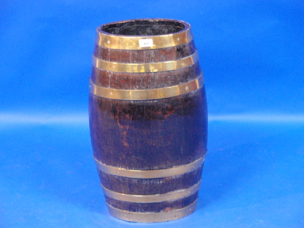 Appraisal: An oak brass bound keg cm high