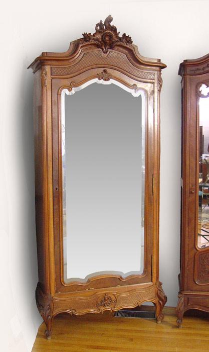 Appraisal: TH C FRENCH WALNUT ARMOIRE Single beveled mirror door with