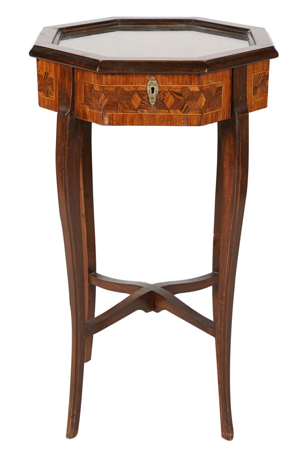 Appraisal: MAHOGANY PARQUETRY TABLE VITRINEwith a hinged glazed octagonal top inches