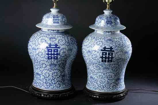 Appraisal: PAIR CHINESE BLUE AND WHITE PORCELAIN JARS AND COVERS Electrified