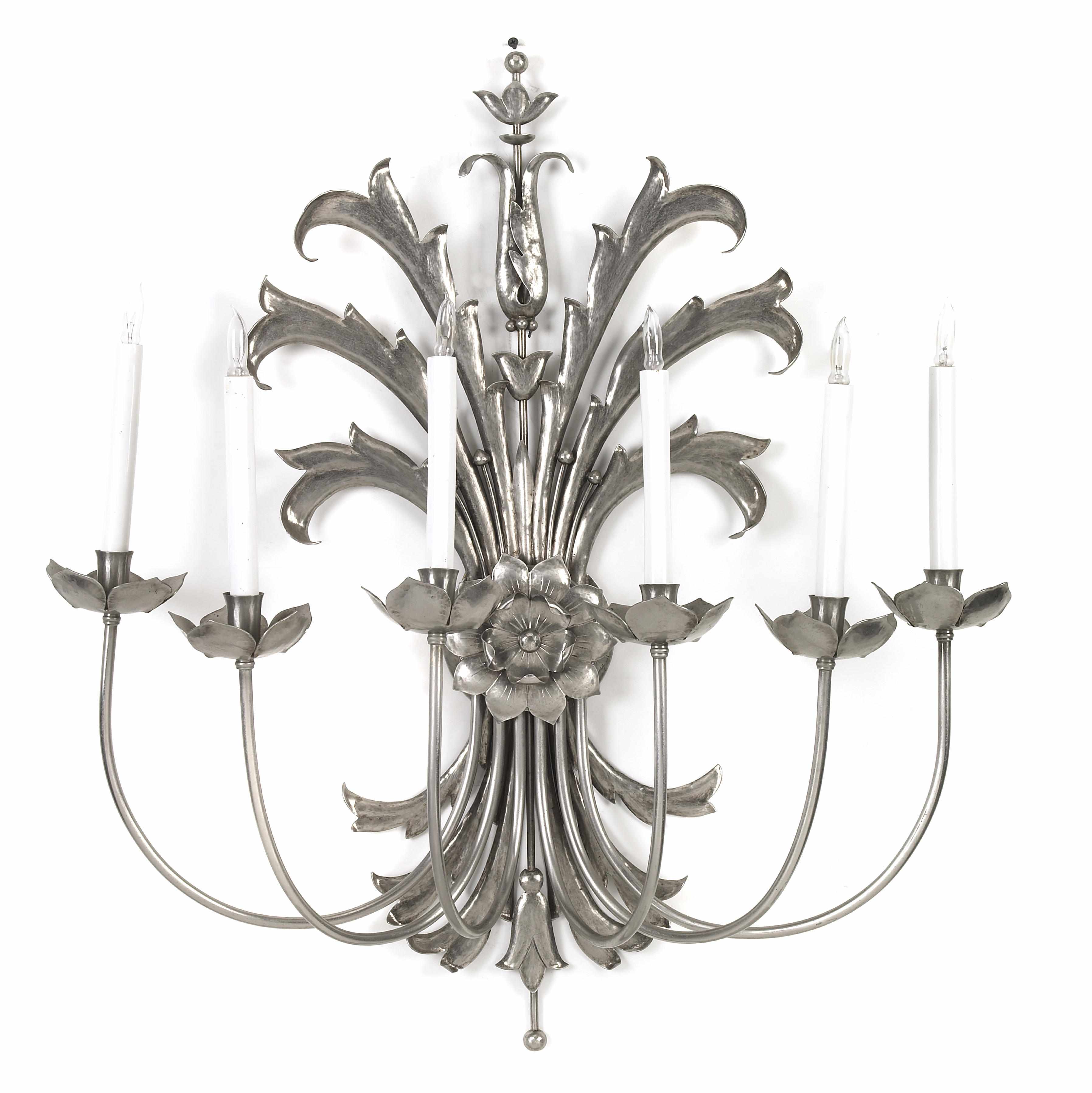 Appraisal: A Hans Grag for Gump's hammered silvered metal six-light wall