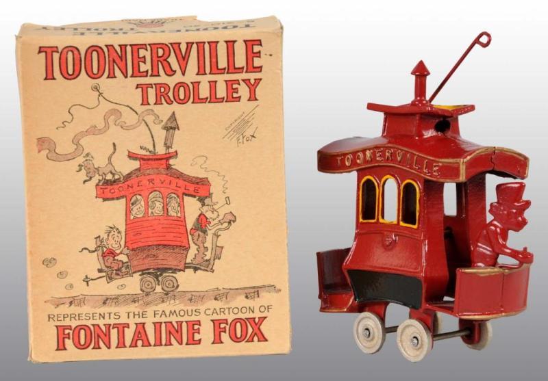 Appraisal: Cast Iron Dent Toonerville Trolley in Orig Box Description Original