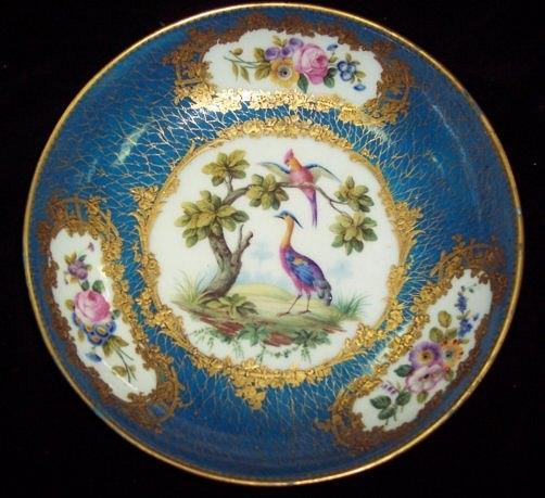 Appraisal: A S vres shallow bowl painted with exotic birds in