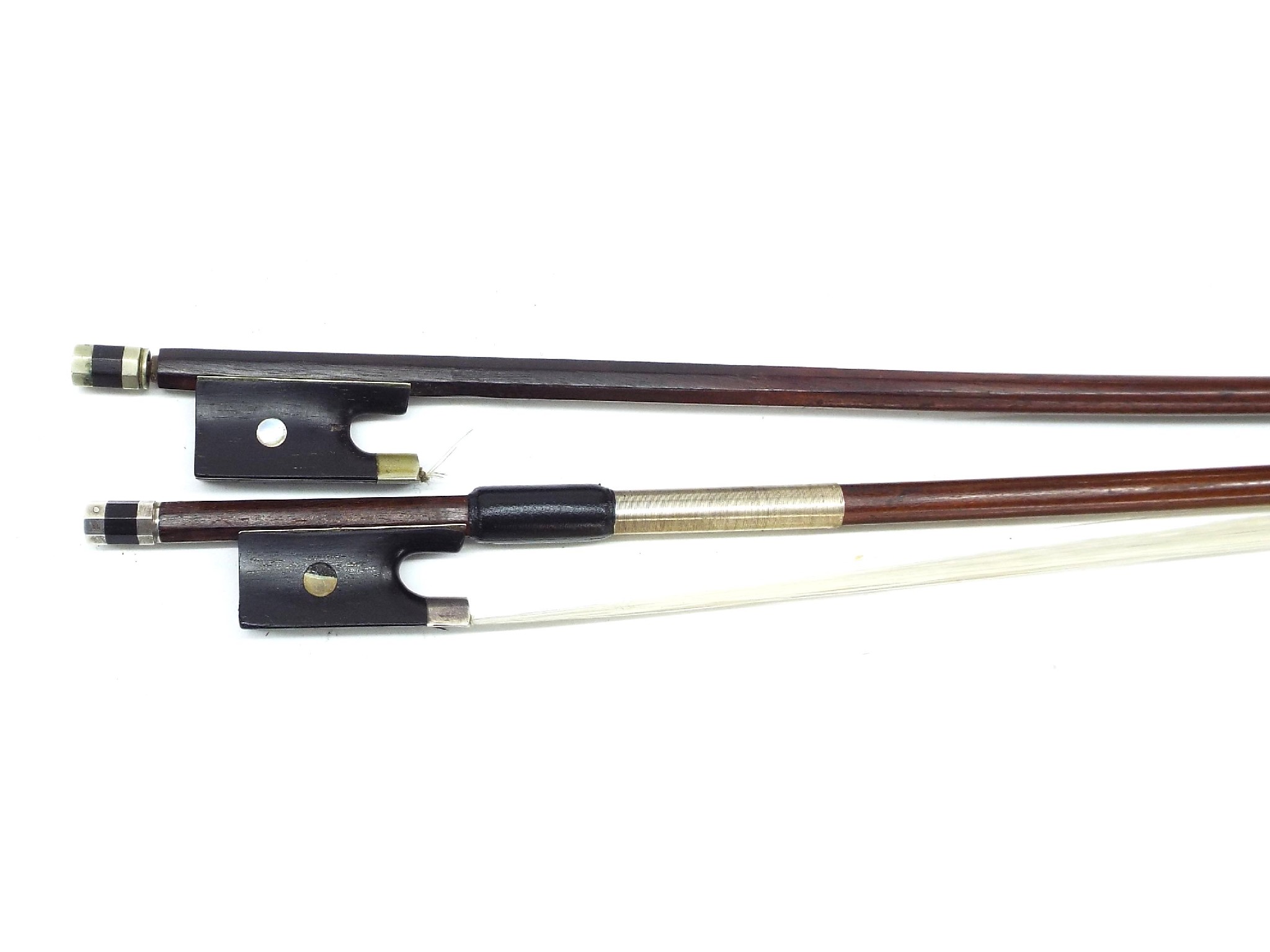 Appraisal: Nickel mounted violin bow stamped Louis Bazin gm unhaired also