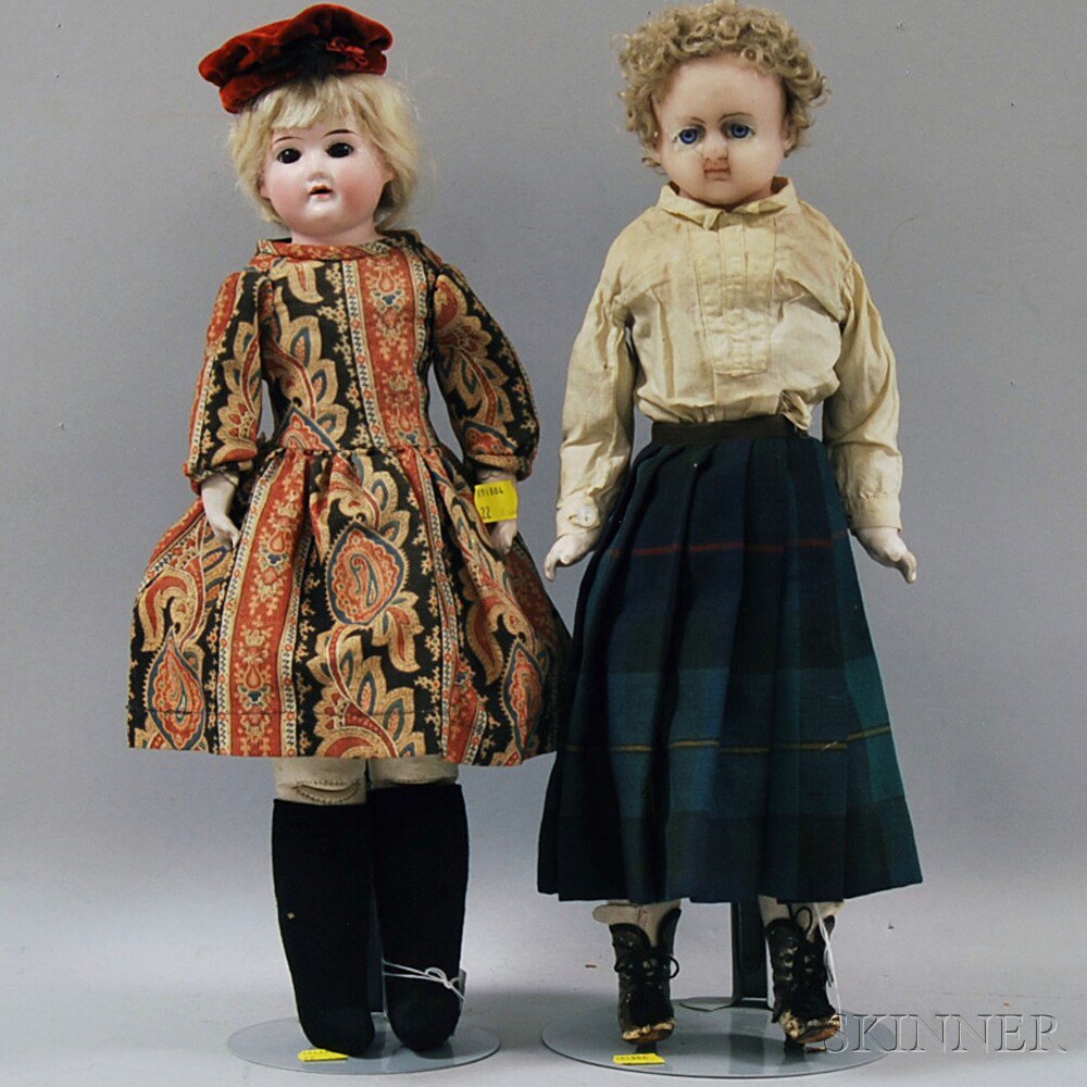 Appraisal: German Bisque Shoulder Head Girl and a Wax Doll the