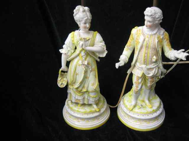 Appraisal: Pair of Victorian Porcelain Figural Lamps man woman yellow decoration