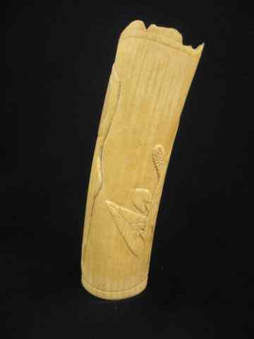 Appraisal: Carved African Ivory Tusk woman in dress carrying a basket