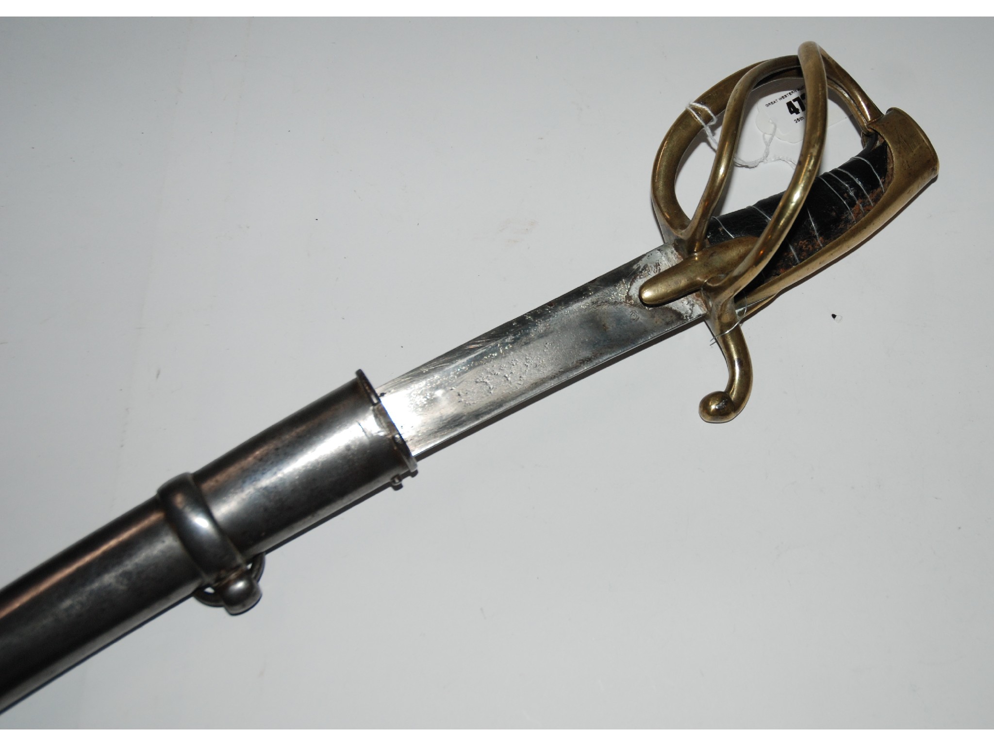 Appraisal: An th Century French brass-mounted heavy cavalry sabre in steel