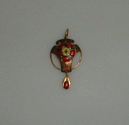 Appraisal: An Arts and Crafts style pendant and an insert brooch