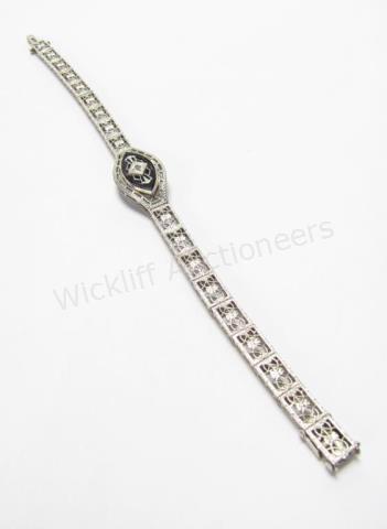 Appraisal: A vintage K white gold art deco filigree link bracelet