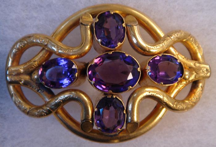 Appraisal: Gold-filled Brooch Victorian type knot brooch containing five large amethyst