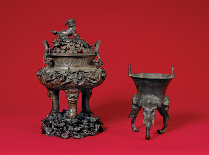 Appraisal: ORIENTAL PATINATED BRONZE INCENSE BURNER Raised on three elephant head-form