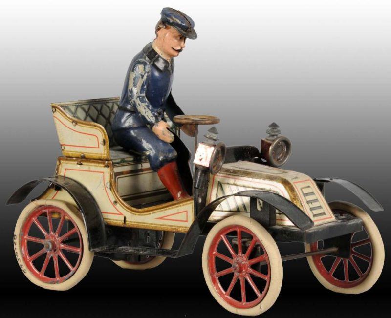 Appraisal: German Carette Open Touring Automobile Toy Description Working Lithographed car