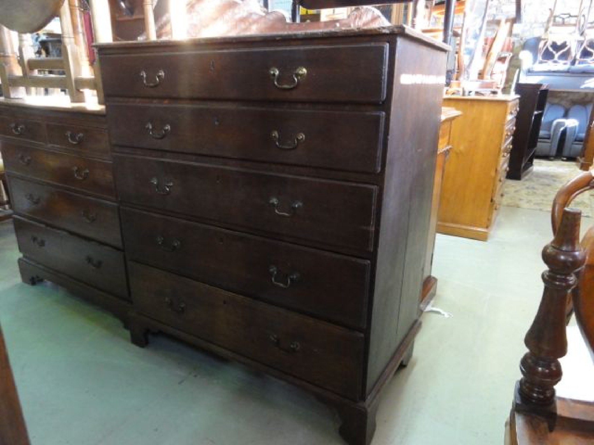 Appraisal: A Georgian oak bedroom chest of five long graduated drawers