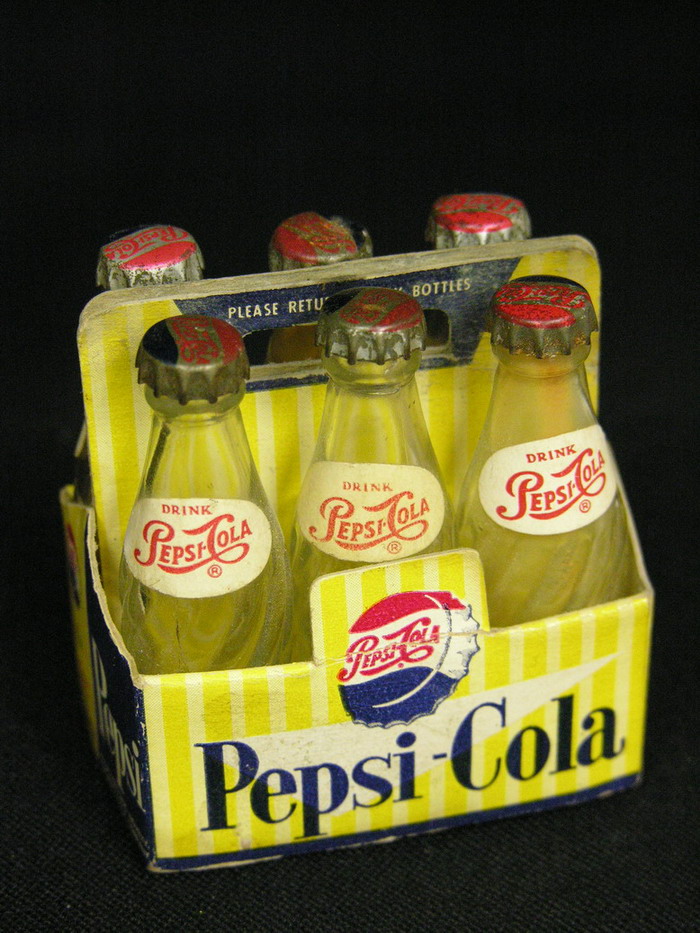 Appraisal: MINIATURE PEPSI CARTON AND BOTTLES Size by