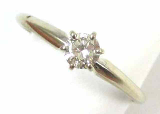 Appraisal: DIAMOND AND WHITE GOLD SOLITAIRE RING The k gold ring