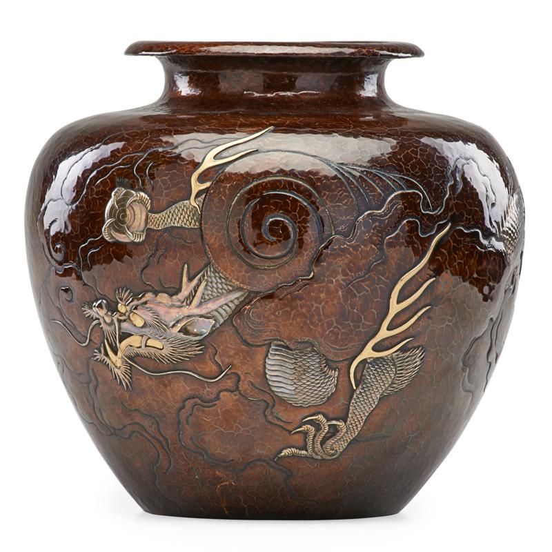 Appraisal: JAPANESE MEIJI COPPER VASE Hammered copper with applied silvered dragon