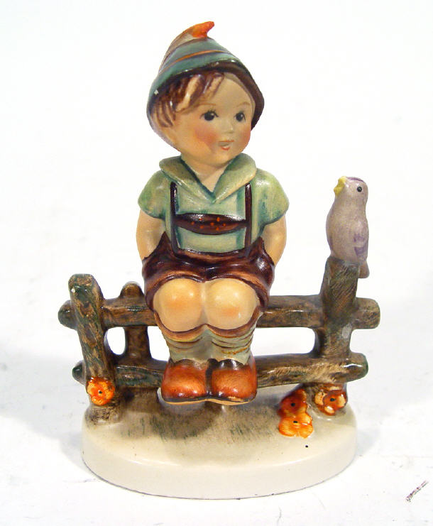 Appraisal: Hand painted Hummel figure of a boy on a fence