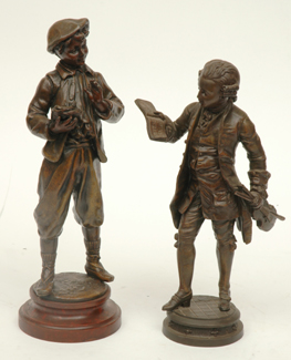 Appraisal: TWO SPELTER FIGURES Cast as a boy and a gentleman