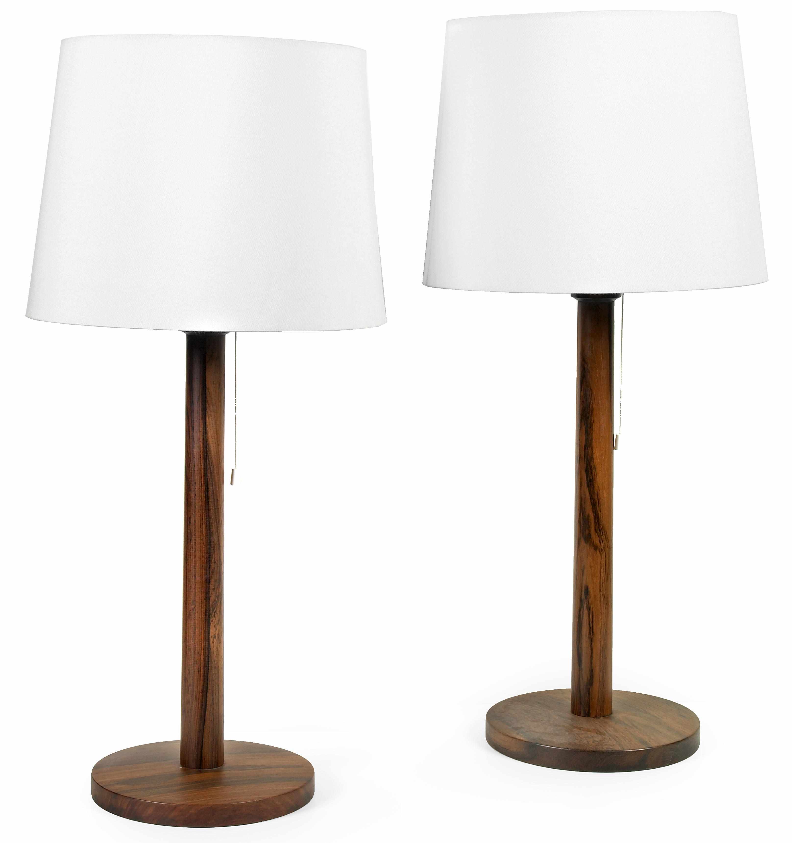 Appraisal: A pair of Luxus rosewood and plastic table lamps probably