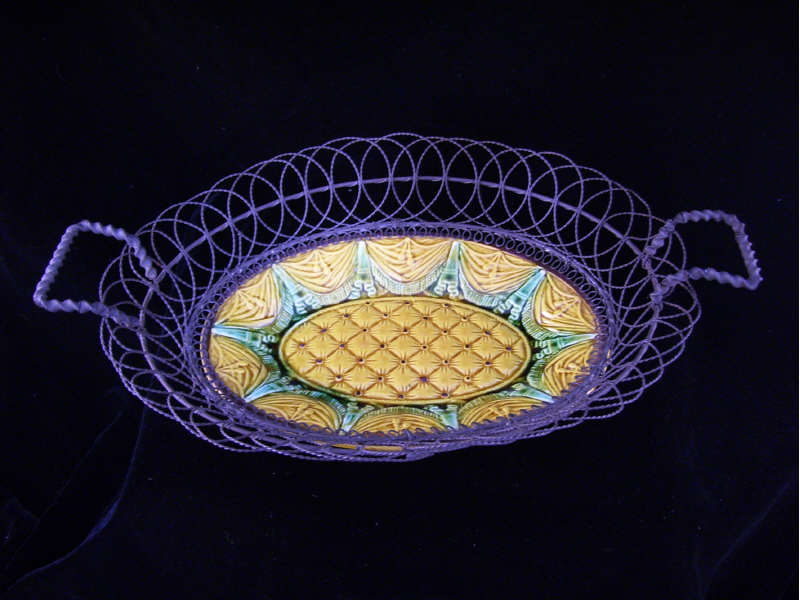 Appraisal: Majolica Wire Bread Basket Unusual wire woven bread basket with