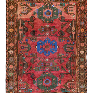 Appraisal: Two Caucasian Wool Rugs TH CENTURY Larger feet inches x