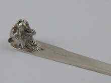 Appraisal: A modern silver letter opener with cast Jaguar head forming