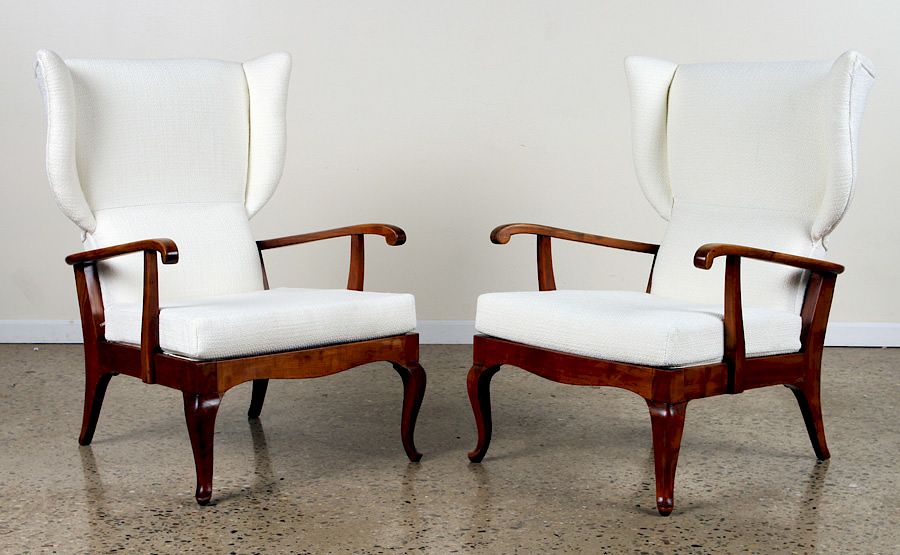 Appraisal: RARE PAIR ITALIAN WALNUT OPEN ARM WING CHAIRS A rare