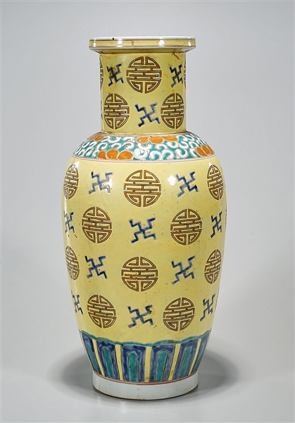 Appraisal: Chinese enameled porcelain vase of shou character design over yellow