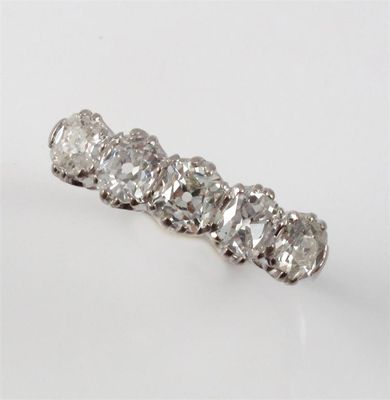 Appraisal: A diamond five stone ring set with five cushion shaped