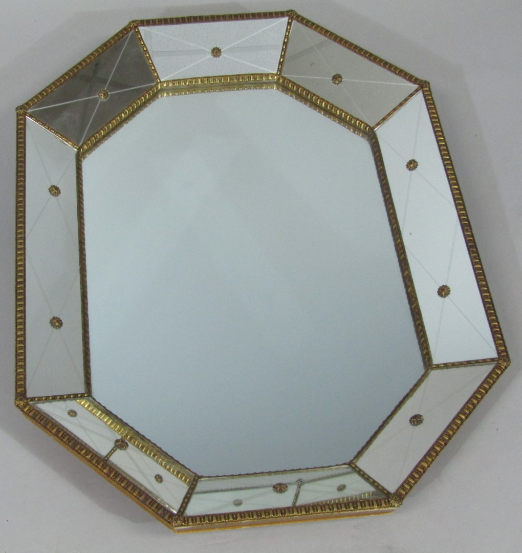 Appraisal: A thC bevel edge wall mirror of highly elaborate outline