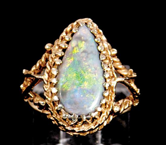 Appraisal: Black opal and gold ring pear-shaped black opal approximate x