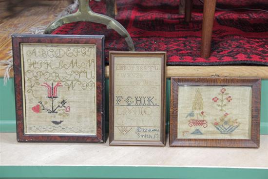 Appraisal: THREE FRAMED SAMPLERS An alphanumeric marking sampler signed ''Eliza Smith''