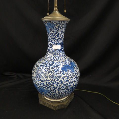 Appraisal: Oriental Blue White Porcelain Lamp flowering vine decor body