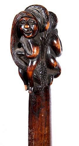 Appraisal: Adam and Eve Folk-Art Cane Adam and Eve Folk-Art Cane