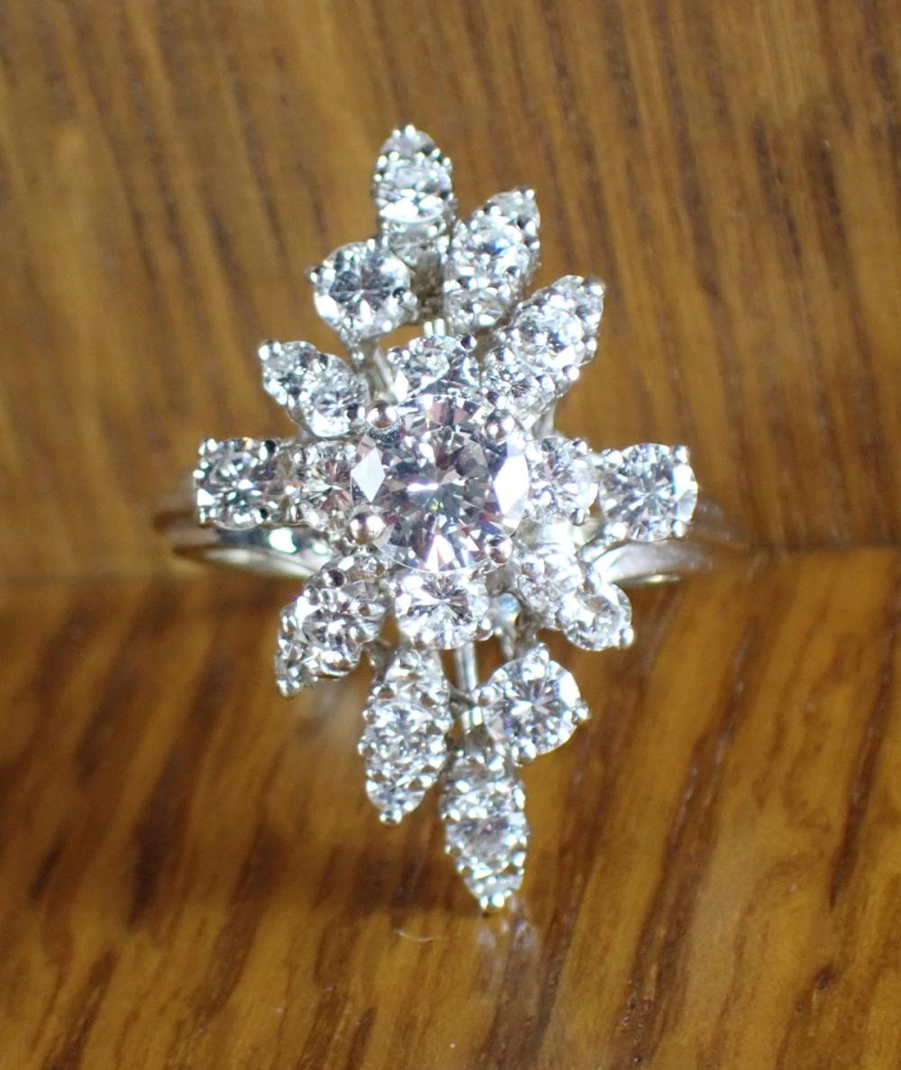 Appraisal: DIAMOND AND EIGHTEEN KARAT WHITE GOLD CLUSTER RING with appraisal