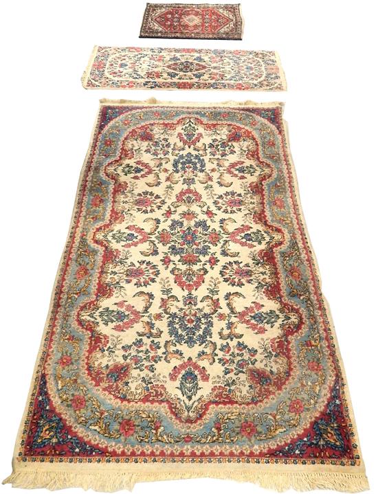 Appraisal: RUGS Three rugs two Kirmans with blue and pink floral