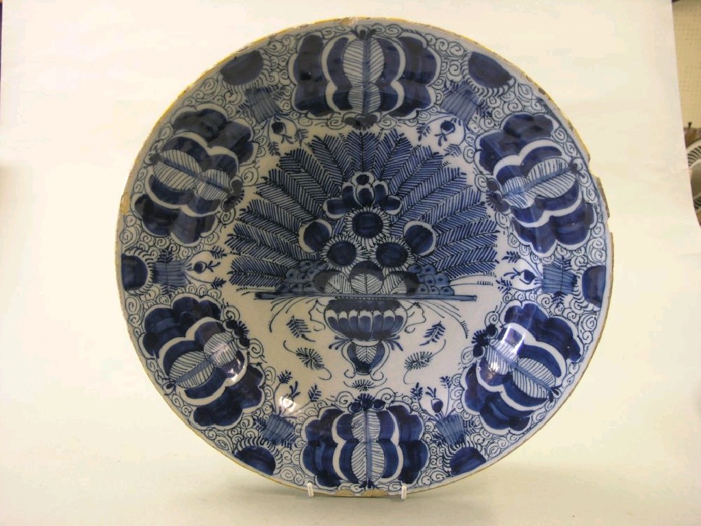 Appraisal: An early th century English delftware charger peacock design painted