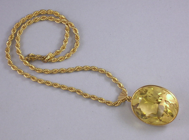 Appraisal: Lemon Quartz Pendant in an kt Gold Frame together with