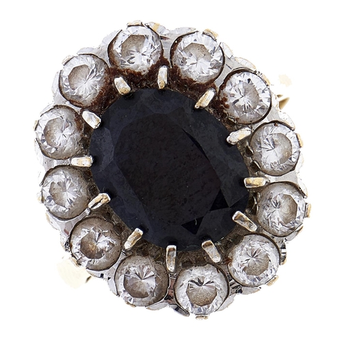 Appraisal: A sapphire and white stone cluster ring in gold marked