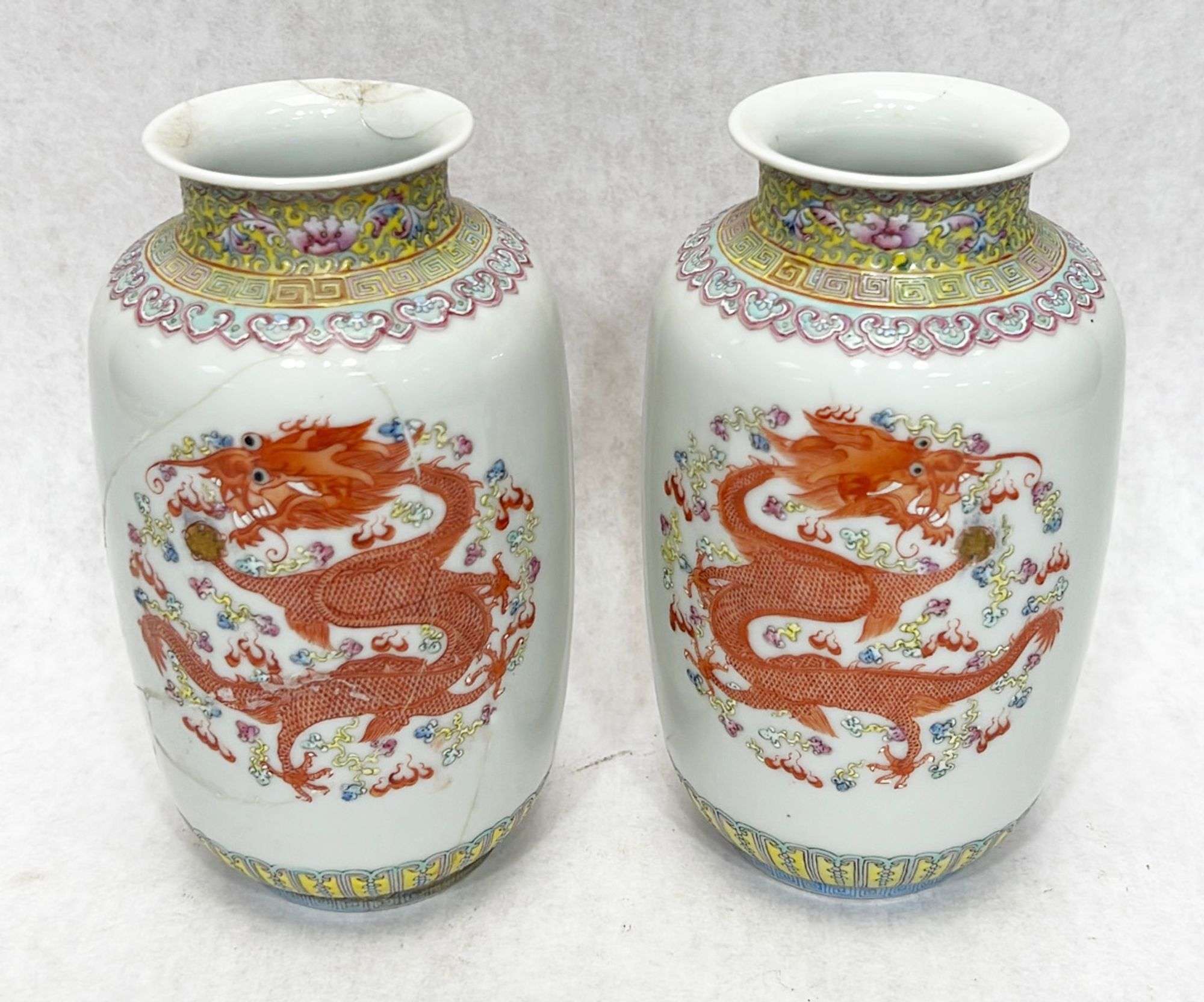 Appraisal: Pair Chinese famille rose dragon porcelain vasesEarly to mid thC