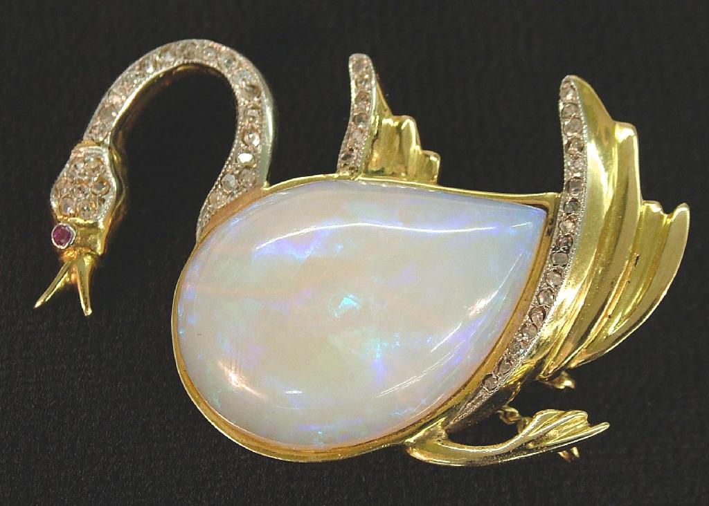 Appraisal: Attractive opal and gold swan brooch set with a large