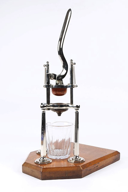 Appraisal: A LATE VICTORIAN CHROMIUM PLATED CITRUS FRUIT PRESS by Underwood