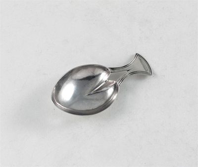 Appraisal: A George III caddy spoon with a bifurcated axe shaped