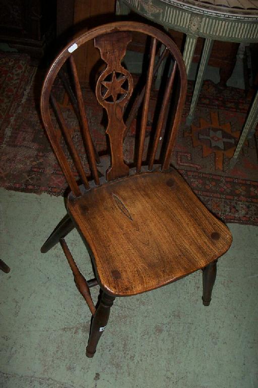 Appraisal: A pair of Georgian Windsor stick back single chairs with